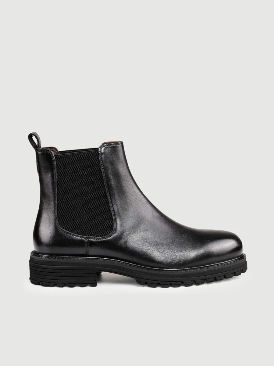 BEATLES IN PELLE NERA