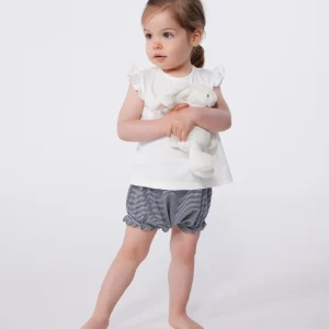 Blusa senza maniche in cotone bianco