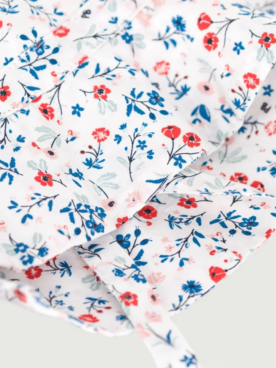 Cappellino con laccetti e stampa a fiori - immagine 3