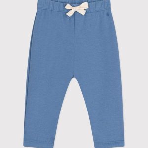 Pantaloni tinta unita bluette in tessuto felpato