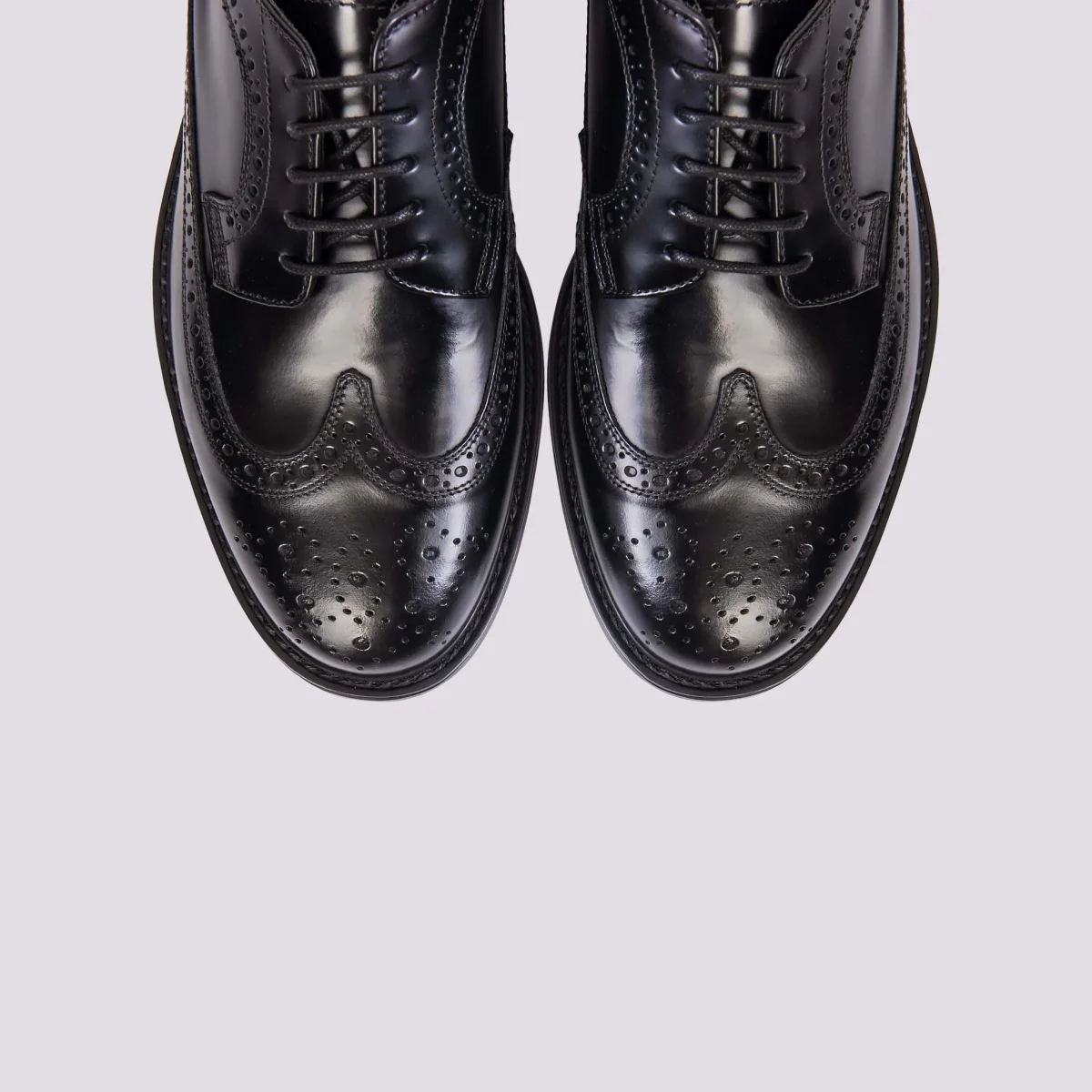 STRINGATA IN PELLE CON DETTAGLIO CODA DI RONDINE - immagine 4