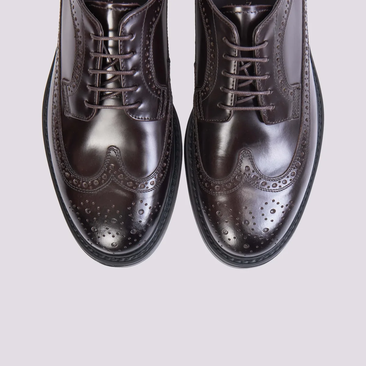 STRINGATA IN PELLE CON DETTAGLIO CODA DI RONDINE - immagine 4