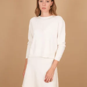 GIROCOLLO IN MAGLIA  CON MICRO SPACCHI LATERALI PANNA