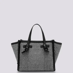 Borsa a mano Miss Marcella in tessuto spiga nero bianco